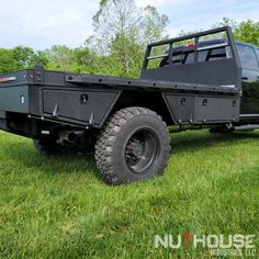 an off road utility vehicle parked in the grass