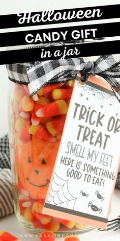 halloween candy gift in a jar with the tag trick or treat here is something good to eat