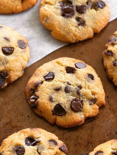 chocolate chip cookies on a baking sheet ready to be eaten