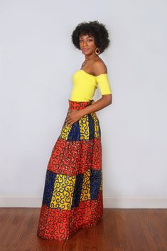 "Sizes S, M, L, XL are ready to ship *African Ankara Print - Multicolor *Maxi length *3 inches thick waistband *Perfectly pleated waist *Two side pockets *Zipper closure at the back S I Z E C H A R T XS: Waist 25\" - 26\" S: Waist 28\" - 30\" M: Waist 31\"- 32\" L : Waist 33\" - 34\" XL: Waist 35\" - 36\" XXL: Waist 37\" - 39\" 3XL: Waist 40\" - 42\" 4XL Waist 43 - 46 PROCESSING TIME: 1-3 business days Kindly note that due to variations in computer monitors, tablets, and/or mobile device setting Fitted Multicolor Long Skirt, Multicolor Fitted Long Wrap Skirt, Fitted Multicolor Lined Maxi Skirt, High Waist Multicolor Pleated Skirt, Fitted Multicolor Tiered Wrap Skirt, Fitted Flared Yellow Maxi Skirt, Yellow Wide Leg Maxi Skirt With Lining, Multicolor Lined Wrap Skirt, Multicolor Relaxed Flared Wrap Skirt