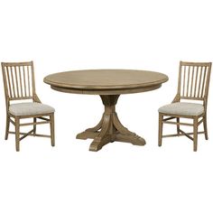 a wooden table and two chairs sitting next to each other