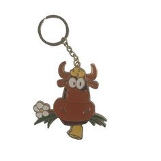 a key chain with a cartoon cow on it