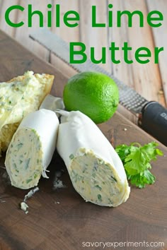 a knife and some food on a wooden cutting board with the words chile lime butter