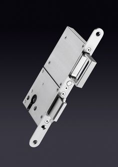 an image of a door hinge on a black background