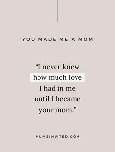 the quote you made me a mom is shown in black and white on a gray background