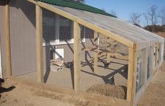 a small chicken coop with chickens in it