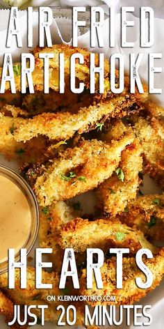 air fried artichoke hearts with dipping sauce on the side and text overlay that reads, air fried artichoke hearts just 20 minutes