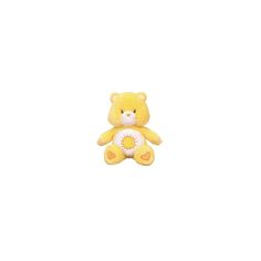 a small yellow teddy bear with a white flower in it's mouth on a white background