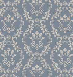 a blue and white wallpaper with floral designs