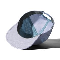 The new XL Performance White Trucker is the perfect snapback hat for big heads. The deep, trucker style hat provides a deep, comfortable fit. Side ventilation keeps your head dry and cool. This extra large adjustable snapback is constructed of high quality materials and is designed to fit heads with a hat size range of 7 1/2 to 8 1/4. View the size chart below if you don't know your head size. This premium hat is also layered with high quality details for elevated style, including a reflective l Hats For Big Heads, Elevated Style, Mesh Panel, Material Design, Hat Sizes, Snapback Hat, Snapback Hats, Hat Fashion, Custom Fit