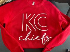 Red kingdom, baby! This sweatshirt is super soft and fleecey on the inside. For a more oversized fit we recommend sizing up one size. Diy Kc Chiefs Shirt, Chiefs Shirts For Women, Diy Chiefs Shirts, Red Sweats For Fall Loungewear, Red Fall Loungewear Sweats, Oversized Red Fleece Sweatshirt, Red Oversized Fleece Sweatshirt, Red Crew Neck Sweatshirt With Relaxed Fit, Red Relaxed Fit Crew Sweatshirt