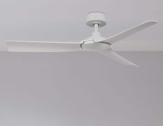 a white ceiling fan in a room