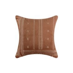 a brown and white pillow on a white background