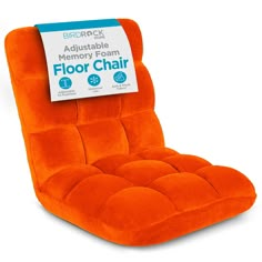 an orange chair with a sign attached to it's back and the words, adjustableable memory foam floor chair