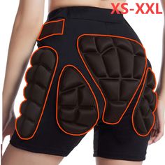 the back of a woman's shorts with an orange and black design on it