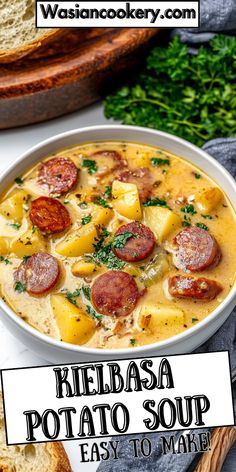 a bowl of kielbasa potato soup with bread on the side