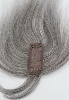 Synthetic hair topper with bangs for women. Two-clip silk realistic center part. It is the perfect solution for hair loss to add more volume to your hair. It also works best for female-pattern baldness and thinning hair near the crown area or broader part. Human Hair Toppers For Thinning Hair, Hair Toppers For Thinning Hair, Grey Hair Topper, Bun Extensions, Grey Hair Pieces, Female Pattern Baldness, Buy Wigs, Beautiful Gray Hair, Choppy Bob