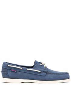 Navy blue leather Dockside Portland boat shoes from Sebago featuring a stitch detail, a lace detail, a round toe, a slip-on style, a branded insole and a white rubber sole. Blue Loafers, Aviator Watch, Balenciaga Track, Loafer Slippers, Balenciaga Triple S, Summer Beach Wear, Derby Shoes, Espadrille Shoes, Blue Shoes