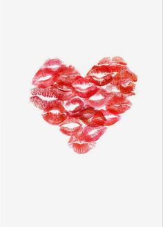 lipstick kisses arranged in the shape of a heart