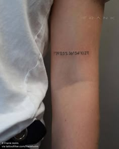 a woman's arm with the words paris on it and her name written in black ink