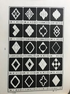 a black and white poster with different designs on it's back side, including squares, rectangles, and diamond shapes