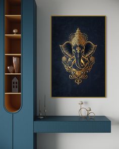 an elephant is on the wall above a blue table