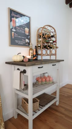 a kitchen island with wine bottles on it