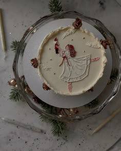 a cake with frosting and decorations on it