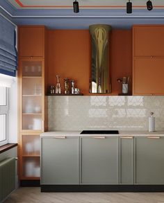 a kitchen with orange cabinets and white counter tops, along with an oven in the center