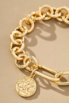 Find ANTHROPOLOGIE Chunky-cha Co Charm Bracelet on Editorialist. 14k gold-plated brass; rhodium-plated brass Clasp closure Imported Chunky-Chain Coin Charm Bracelet in Silver, Women's, Gold/Plated Brass Designer Bracelet Stack, Gold Coin Jewelry, Coin Charm Bracelet, Designer Bracelet, Bracelet In Silver, Wrist Jewelry, Gold Charm Bracelet, Coin Jewelry, Gold Coins