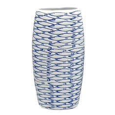 a blue and white vase sitting on top of a table