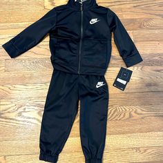 Brand New With Tags Nike Track Suit Outfit Color: Black Size: 18 Months Brand: Nike Black Cotton Playwear Sets, Casual Black Playwear Sets, Black Cotton Playtime Sets, Black Winter Sports Sets, Casual Black Sports Sets, Casual Black Sets For Sports, Nike Two Piece Outfit, Nike Galaxy, Track Suit Outfit