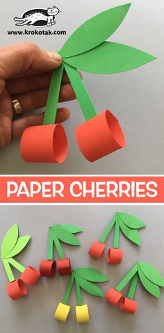 paper cherrys are cut out and placed on top of each other to make an apple tree