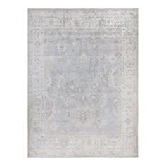 an antique style rug in grey and white