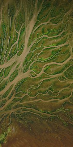 an aerial view of the land and water