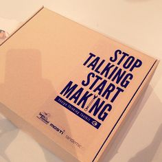 an open box sitting on top of a table with the words stop talking start making