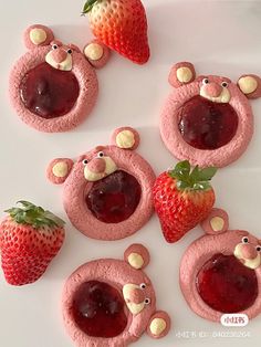 there are cookies shaped like teddy bears and strawberries