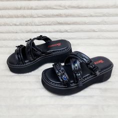 Emily 07 Goth Black 2 Platform Bat Buckle Sandals 6-12  - Demonia Direct - Totally Wicked Footwear Demonia Sandals, Goth Sandals, Louis Vuitton Clutch Bag, Goth Things, Louis Vuitton Clutch, Aesthetic Shoes, Buckle Sandals, Monogrammed Leather, Shipping Orders