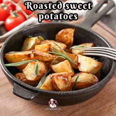 roasted sweet potatoes in a cast iron skillet with rosemary garnish