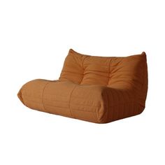 an orange bean bag chair sitting on top of a white floor