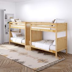 there are two bunk beds in the room with white walls and wood flooring, along with a rug on the floor