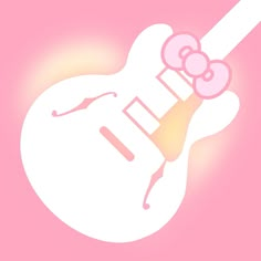 a white guitar with a pink bow on it's neck and the words hello kitty