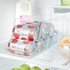 an open refrigerator filled with lots of different types of drinks and food in containers on the shelves