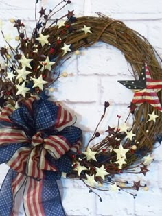 a patriotic wreath on a brick wall