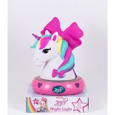 a pink and blue toy horse on top of a box