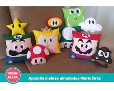 several pillows made to look like mario bros characters on a couch with the caption apostia molds simotadas mario bros