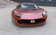 a red sports car parked in front of a building