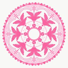 a pink and white circular design with leaves