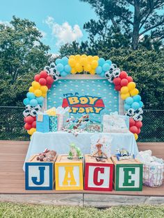 an outdoor birthday party with toys and decorations