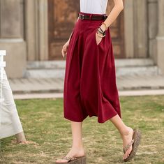 "DETAIL * 50% linen, 50% cotton * Two side pockets * Back Elastic waist * Below knee length * A linen skirt * Plus size skirt * Perfect for summer, spring * Wash by hand or machine with cold water * The model is 170cm (5′ 7″) tall with a 80cm (31.5\") bust, 66cm (26\") waist. She is wearing a XS in red. * Choose CUSTOM Order if you Can't find your size in our size Chart Chang the Length Your Height is not Between 5'1\" - 5\"9\" Your weight is not Between 47 kg - 75 kg SIZE GUIDE Size vary betwee Relaxed Fit Cotton Full Skirt, Cotton Midi Skirt With Pockets, Baggy Cotton Culottes For Spring, Relaxed Fit Midi Skirt With Pockets, Summer Midi Skirt With Pockets, Relaxed Fit Cotton Skirt With Pockets, High Waist Cotton Culottes For Summer, Solid Color Midi Skirt With Pockets, Baggy Cotton Culottes For Summer